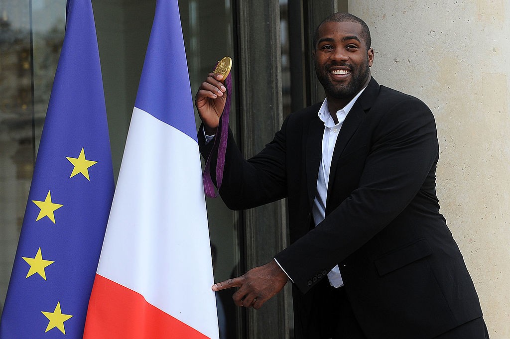 PARIS, FRANCE - SEPTEMBER 17: France's Gold Olympic judo athlete Teddy Riner arrives for a ceremony with France's President Francois Hollande at Elysee Palace on September 17, 2012 in Paris, France. (Photo by Antoine Antoniol/Getty Images)