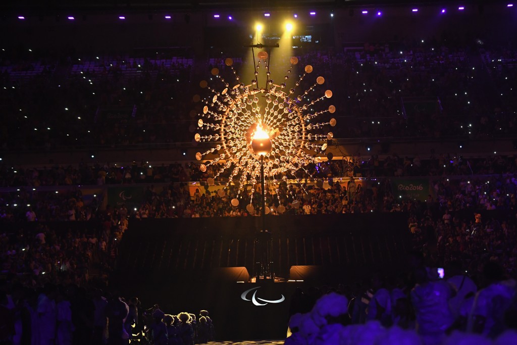 RIO DE JANEIRO, BRAZIL - SEPTEMBER 18: The flame is lowered prior to being extinguished during the closing ceremony of the Rio 2016 Paralympic Games at Maracana Stadium on September 18, 2016 in Rio de Janeiro, Brazil. (Photo by Atsushi Tomura/Getty Images for Tokyo 2020)