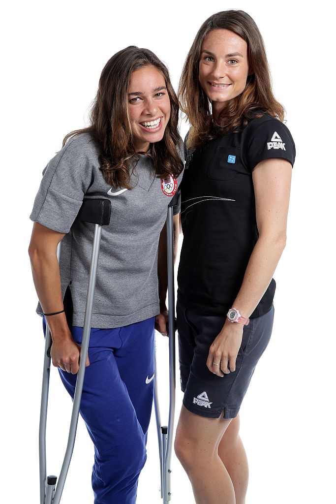 RIO DE JANEIRO, BRAZIL - AUGUST 17: New Zealand distance runner, Nikki Hamblin and American runner, Abbey D'Agostino pose for a portrait on August 17, 2016 in Rio de Janeiro, Brazil. Hamblin and D'Agostino came last in their 5000m heat on Tuesday after they collided and fell midway through their race. The pair have been commended for their sportsmanship after they helped each other up to finish the race. (Photo by Chris Graythen/Getty Images)